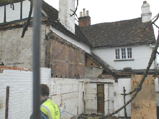 Demolition of the Beer Cellar exposes wooden beams in the former roof void