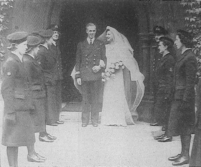 'A Guard-of-honour for Mrs. Charity P. Simonds, of Arborfield Cross, and Lt. Ian D. McLaughlan, D.S.C., R.N., who were married in London'